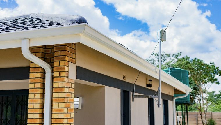 Clean gutters on a house